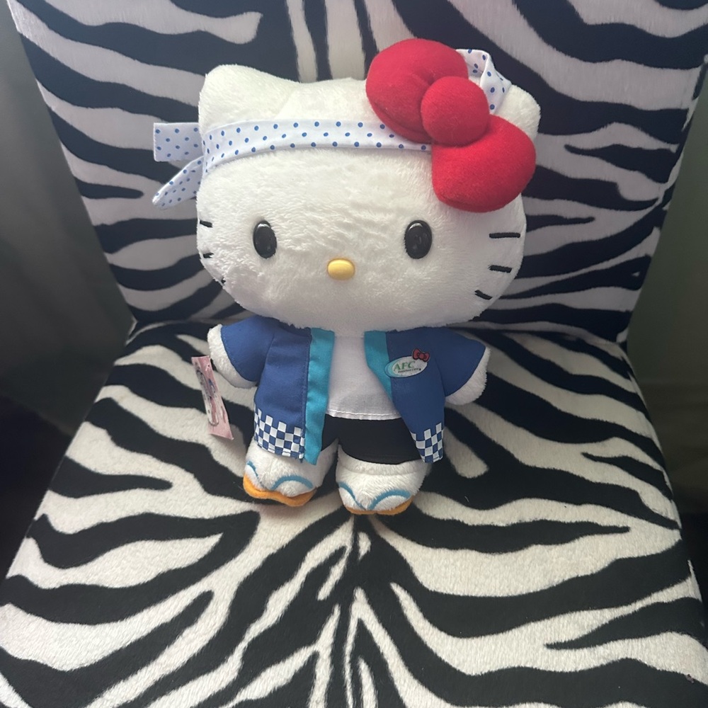 Hello Kitty Plush with Red Bow and Blue Outfit